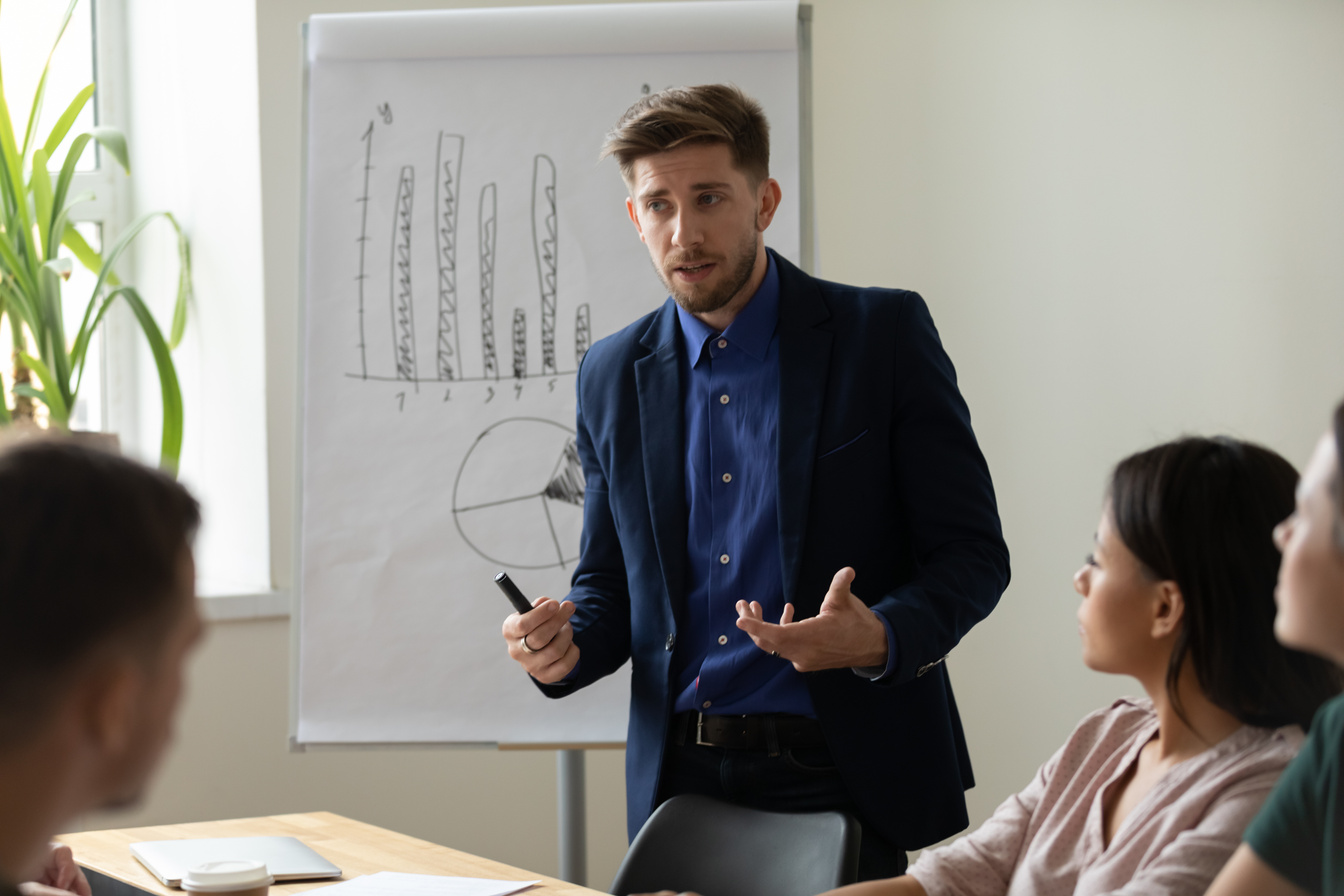 Man Talking with Colleagues 